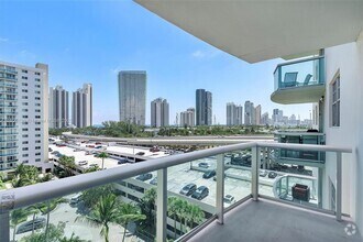 Building Photo - 19390 Collins Ave