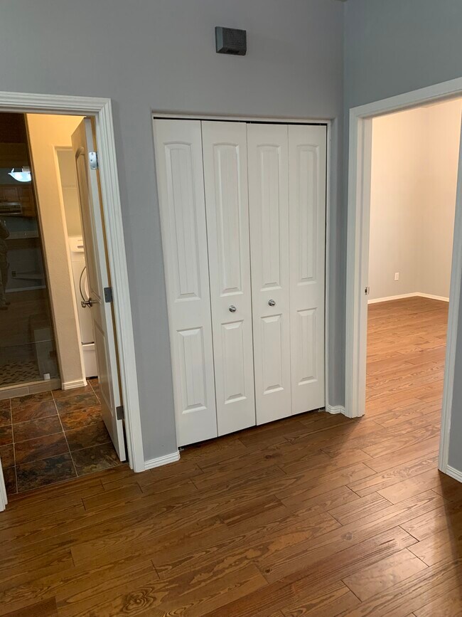 Coat closet between bath and bedroom - 1661 NE Market Dr