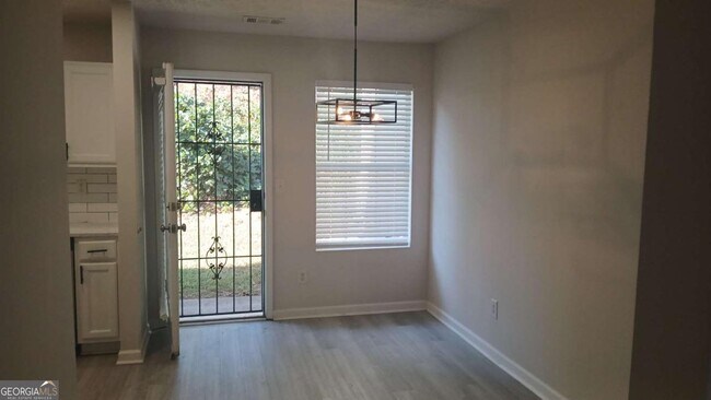 Foto del edificio - 5677 Wind Gate Ln