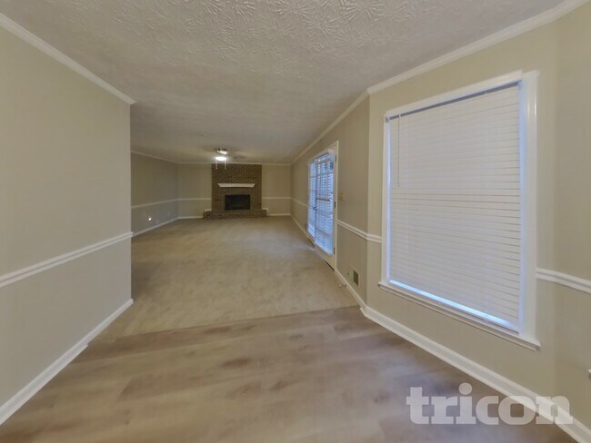 Building Photo - 305 Woodsong Dr