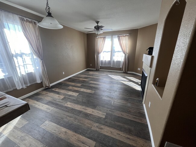 Living room with front range views! - 8662 quinn pointe