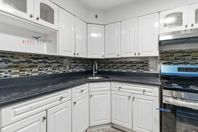 Building Photo - 40-83-83 Denman St