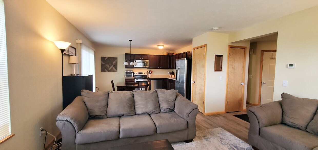 Living rm/kitchen. (photo from neighboring unit with the same layout) - 1756 St Joseph St