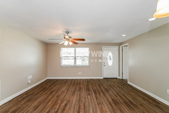 Building Photo - 8509 Portulaca Ave