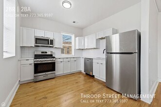 Building Photo - 6132 S Vernon Ave