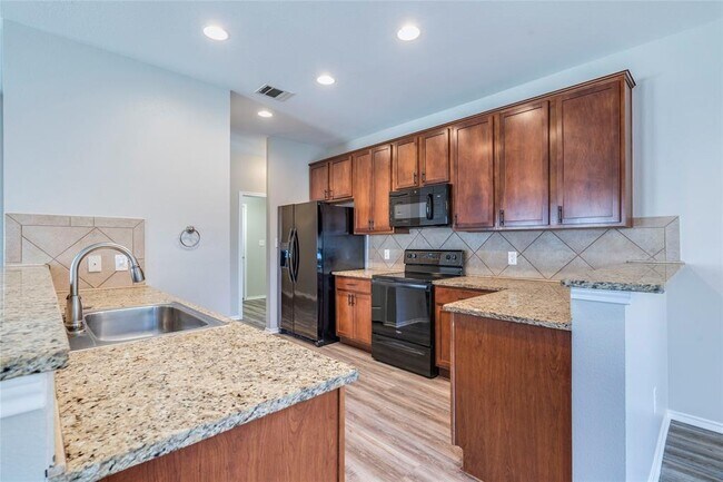 Foto del edificio - 7722 Buck Meadow Dr