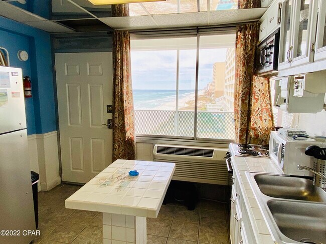 Foto del edificio - 14401 Front Beach Rd