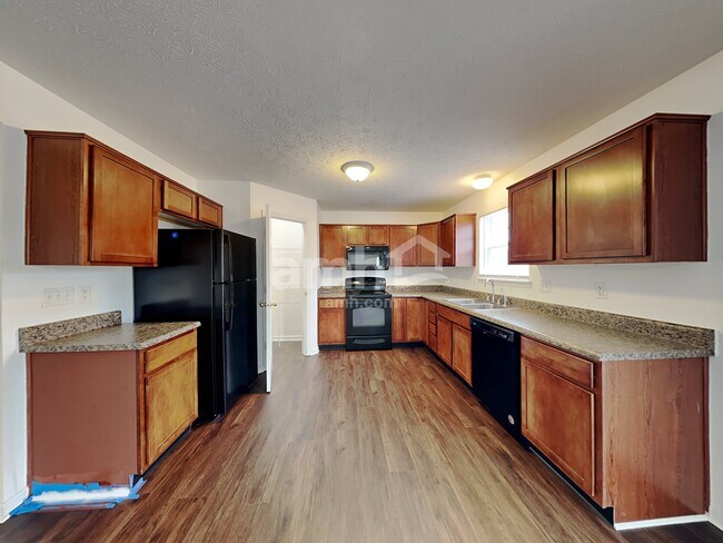 Foto del edificio - 6154 N Woodhaven Dr