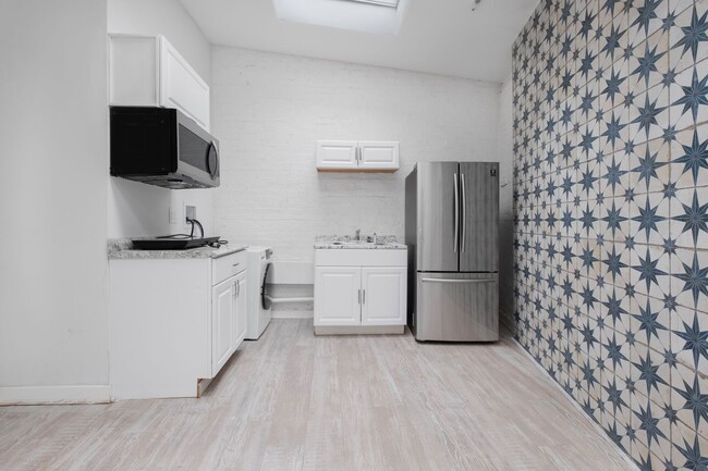Building Photo - Lovely Studio Apartment in Truxton Circle ...
