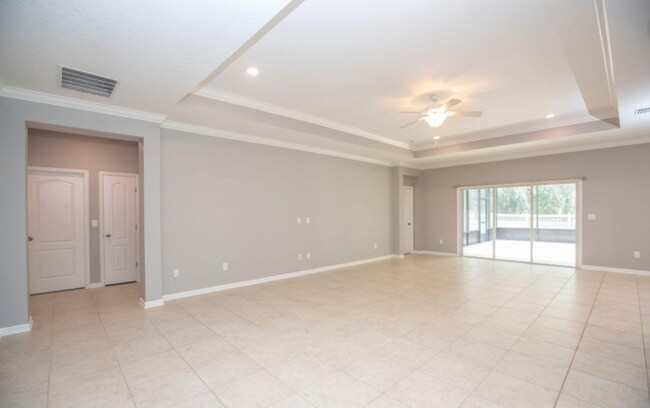 Foto del edificio - COMING SOON! Beautiful 4BR 3BA Home w/ Screened Lanai & Pond View • Garage Parking • Fenced Yard ...