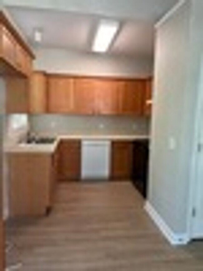 Building Photo - Great home with 2 separate entrances & a Fenced in yard!