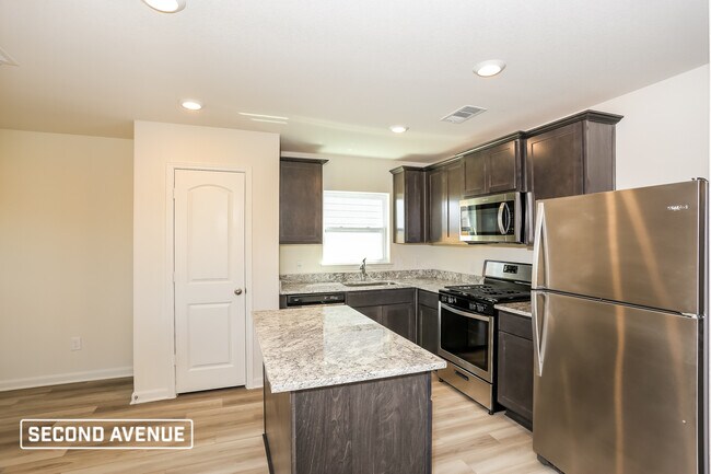 Foto del edificio - 1304 Woodwinds Dr