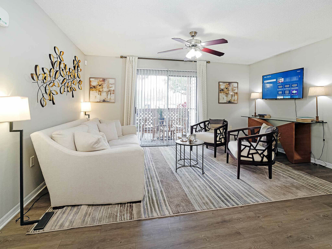 Step into elegance and comfort in this beautifully designed living room, perfect for relaxation and entertainment. - Advenir at The Oaks