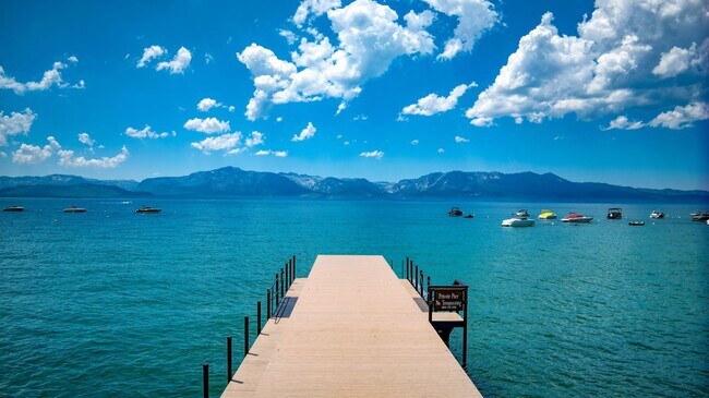 Building Photo - Gated Community with Beach and Dock.  Luxu...