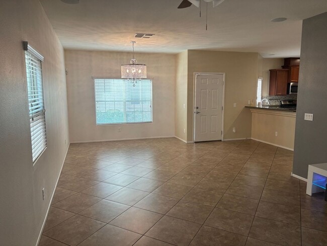 Building Photo - Gated 3-Bedroom Home with Community Pool Near Fort Apache & Blue Diamond
