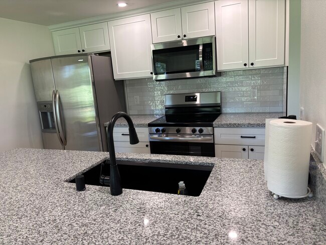 New cabinets, granite countertops appliances - 7435 Fairway Two Ave