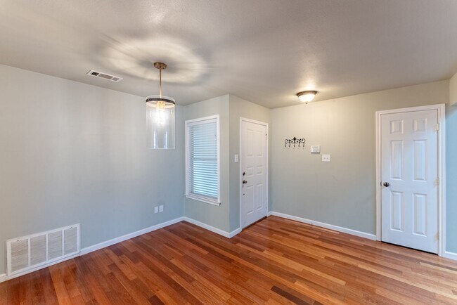 Building Photo - Light-Filled Austin Retreat with Vaulted Ceilings & Covered Back Porch!