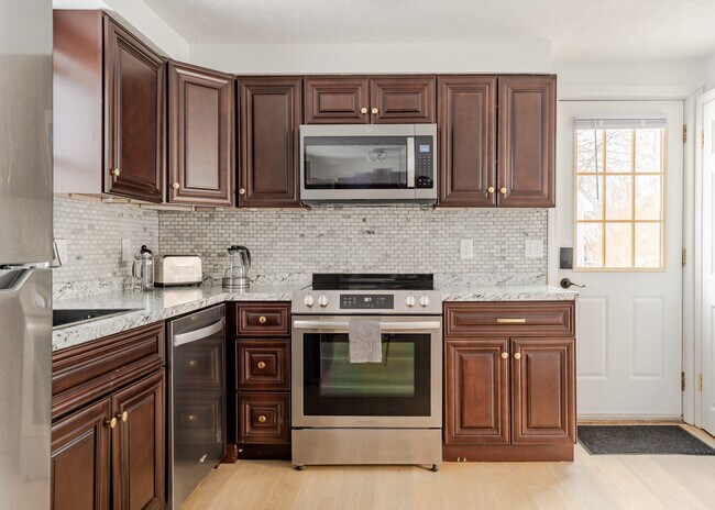 newly renovated kitchen with new appliances - 49 Berkshire Rd