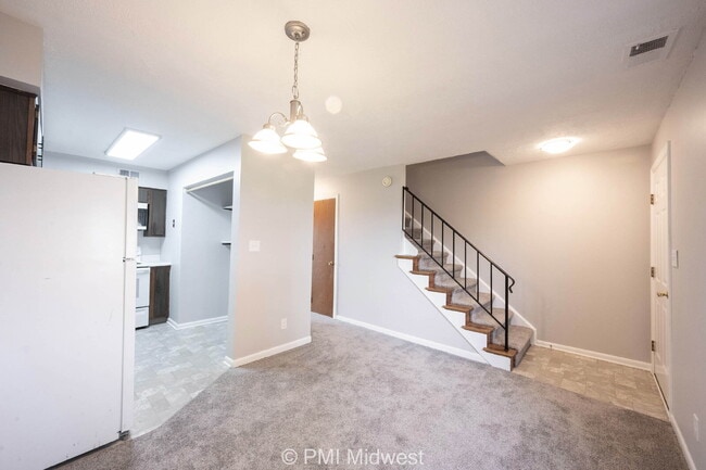 Building Photo - "Charming 2-Bedroom Townhouse Retreat with...