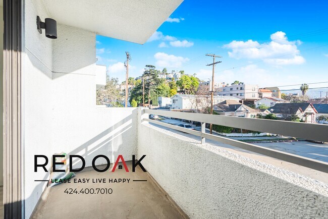 Building Photo - Beautiful Two Bedroom Drenched in Natural ...