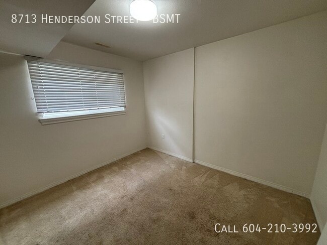 Building Photo - Basement Suite with all Utilities Included