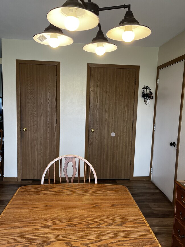 Coat closet and pantry in dinning room - 583 Evans Dr