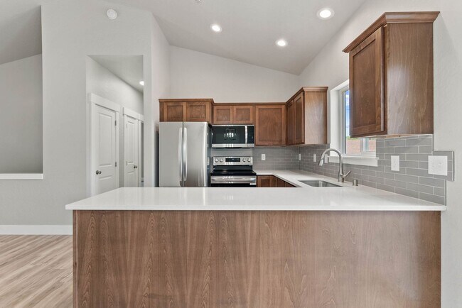 Building Photo - Newly built 4 Bedroom Duplex With Garage