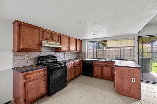 Foto del edificio - 15619 Fall Briar Dr