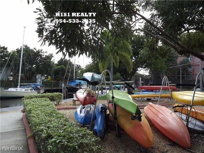 Building Photo - 2 br, 1.5 bath Condo - 1101 River Reach Dr XX