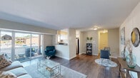 Located at 402 Westover Hills Blvd in Richmond, Virginia, this two-bedroom, one-bathroom residence offers a well-organized single-floor layout designed for comfortable everyday living. The living room serves as the heart of the home, featuring warm hardwood-style flooring and large sliding glass doors that flood the space with natural light and open to a private balcony overlooking the surrounding community. The kitchen is efficiently designed with white cabinetry, dark granite-style countertops, stainless steel appliances including a gas range and refrigerator, and a window above the sink that brings in additional natural light. It connects seamlessly to a dedicated dining area, making the space practical for both cooking and entertaining. The primary bedroom offers a generous footprint with soft carpeting, a window with outdoor views, and access to a closet. The second bedroom is cozy and well-proportioned, also featuring carpet flooring and a window that allows natural light to filter in. The full bathroom is clean and bright, complete with a shower-tub combination. A hallway and closet round out the layout, providing functional storage solutions throughout. The overall ambiance is light, neutral, and move-in ready.