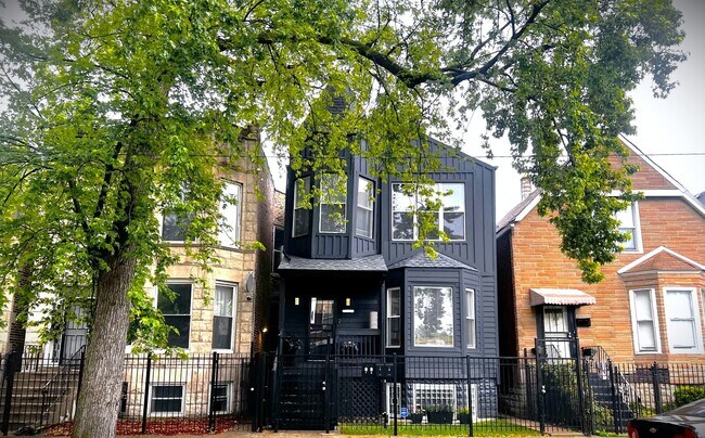 Building Photo - 6613 S Langley Ave