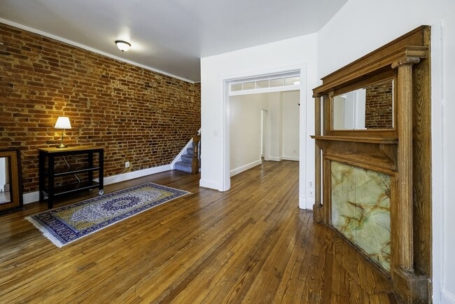 Building Photo - Historic & Charming 3BR Rowhouse near Howard is Move-in Ready!