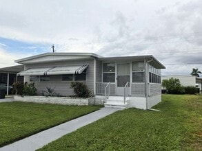 Building Photo - 305 49th Ave Dr W