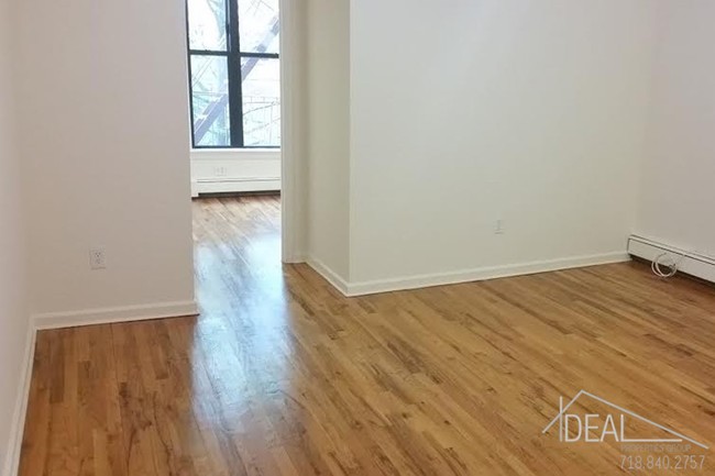 Building Photo - NO FEE 2 Bedroom with Shared Roof Deck