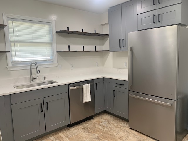 Newly renovated kitchen with open shelving. - 21 Oak Rd