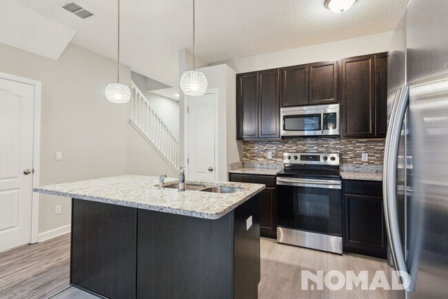 Foto del edificio - Charming 3BR Townhome in Winter Park
