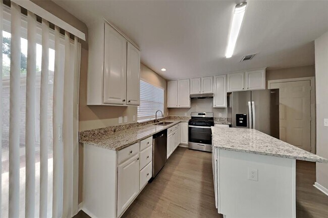 Foto del edificio - 9806 Arrowgrass Dr