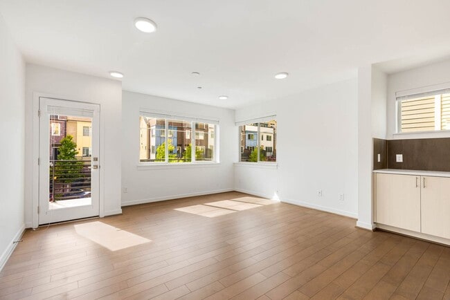 Building Photo - Modern Townhome in Upton at Crossroads Village – Stylish Living in a Prime Location