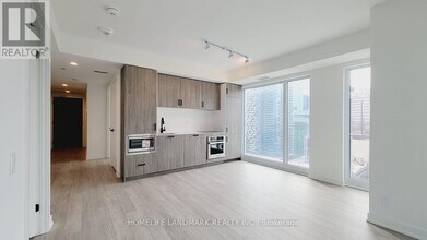 Building Photo - 88 Queen St E