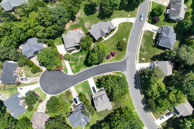 The Mill Creek neighborhood is relatively quiet and surrounded by trees.