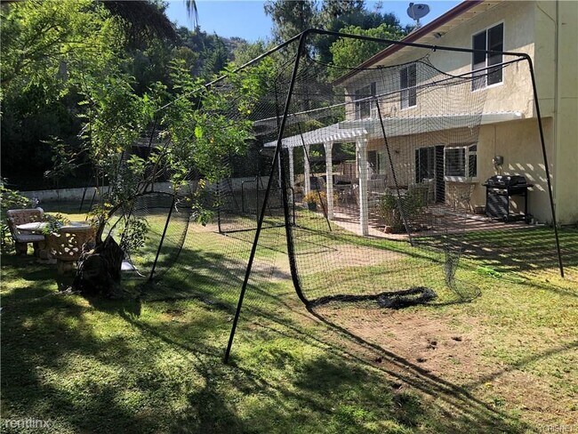 Building Photo - 4 br, 3 bath House - 19946 Turnberry Dr