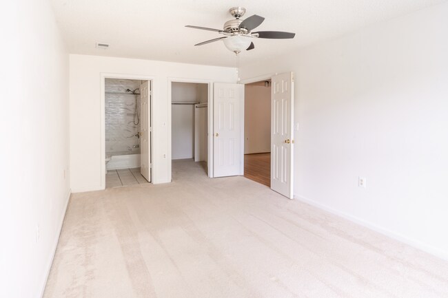 Bedroom with bathroom and walk in closet - 10024 Vanderbilt Cir