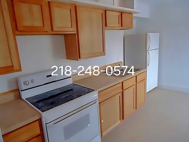 Building Photo - 115 3rd St S