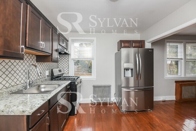 Building Photo - Prepare to be impressed by this 5-bedroom,...
