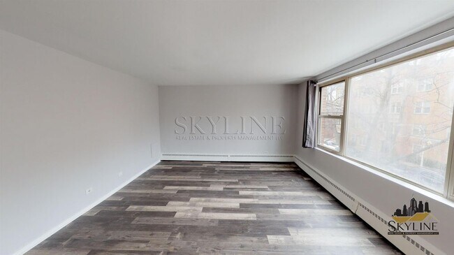 Building Photo - 6833 N. Oakley Avenue Unit 2B