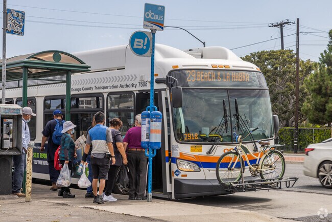 Public Bus picking up passengers at Bus Stop