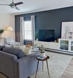 This 1080 square foot apartment in Sarasota, FL offers a harmonious blend of comfort and style. The single-level layout comprises one bedroom, two full bathrooms, and an open-concept living and kitchen area. The primary bedroom, measuring 140 square feet, features a calming color palette with a striking accent wall and ample natural light from large windows.

The modern kitchen boasts wooden cabinetry, granite countertops, and black appliances, creating a sleek and functional cooking space. The living room seamlessly connects to the kitchen, promoting an open and airy atmosphere ideal for entertaining or relaxing.

Both bathrooms are well-appointed, with one featuring a wooden vanity with a granite countertop and a combination shower/tub, while the other offers a clean, minimalist design. The apartment includes two closets for additional storage, with one being a walk-in closet providing ample space for organization.

Throughout the apartment, neutral tones dominate, accented by pops of color in the decor and furnishings. Ceiling fans, carpeted floors in the bedroom, and tiled floors in the kitchen and bathrooms add to the overall comfort and practicality of the space. Large windows in every room allow for plenty of natural light, enhancing the bright and welcoming ambiance of this modern Florida apartment.