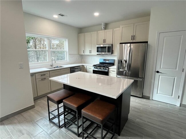 Building Photo - 4500 Kings Lake Dr NE