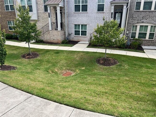 Foto del edificio - 4-bedroom, 3.5-bathroom townhome in Suwanee Walk!
