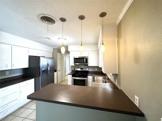 Foto del edificio - 1104 Kinney Ave